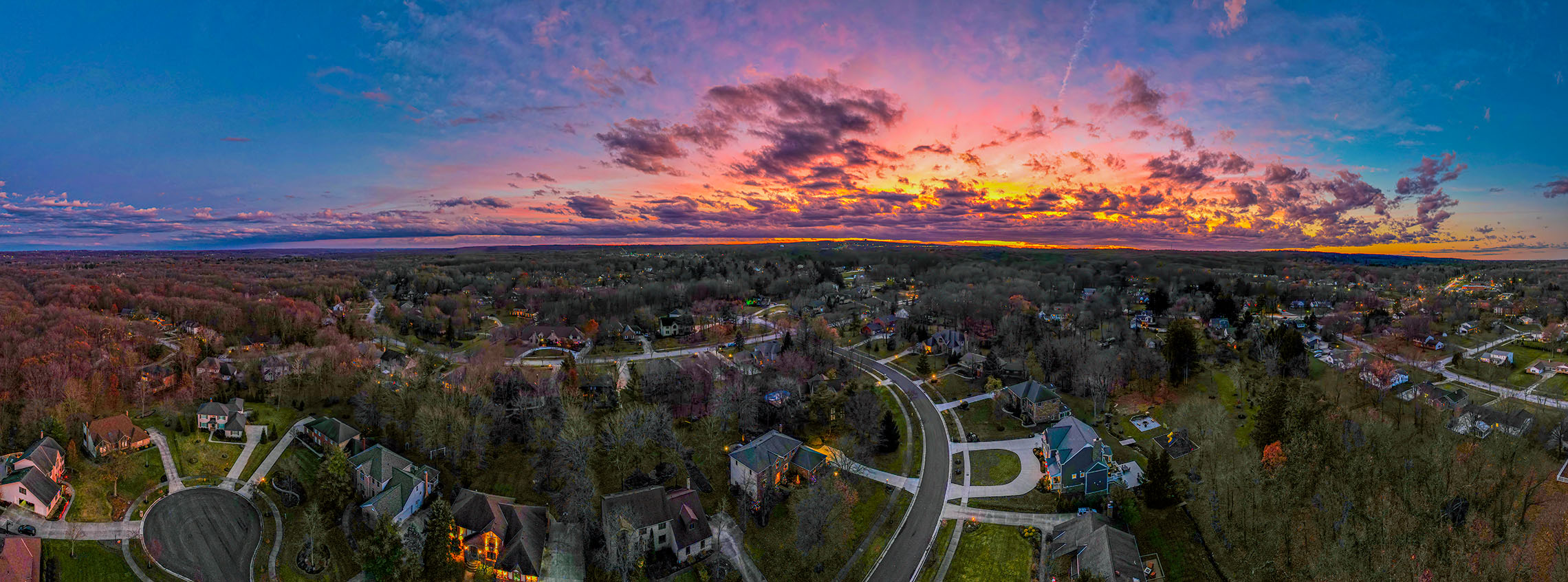 Panoramic Arial Image of sunset over neighborhood